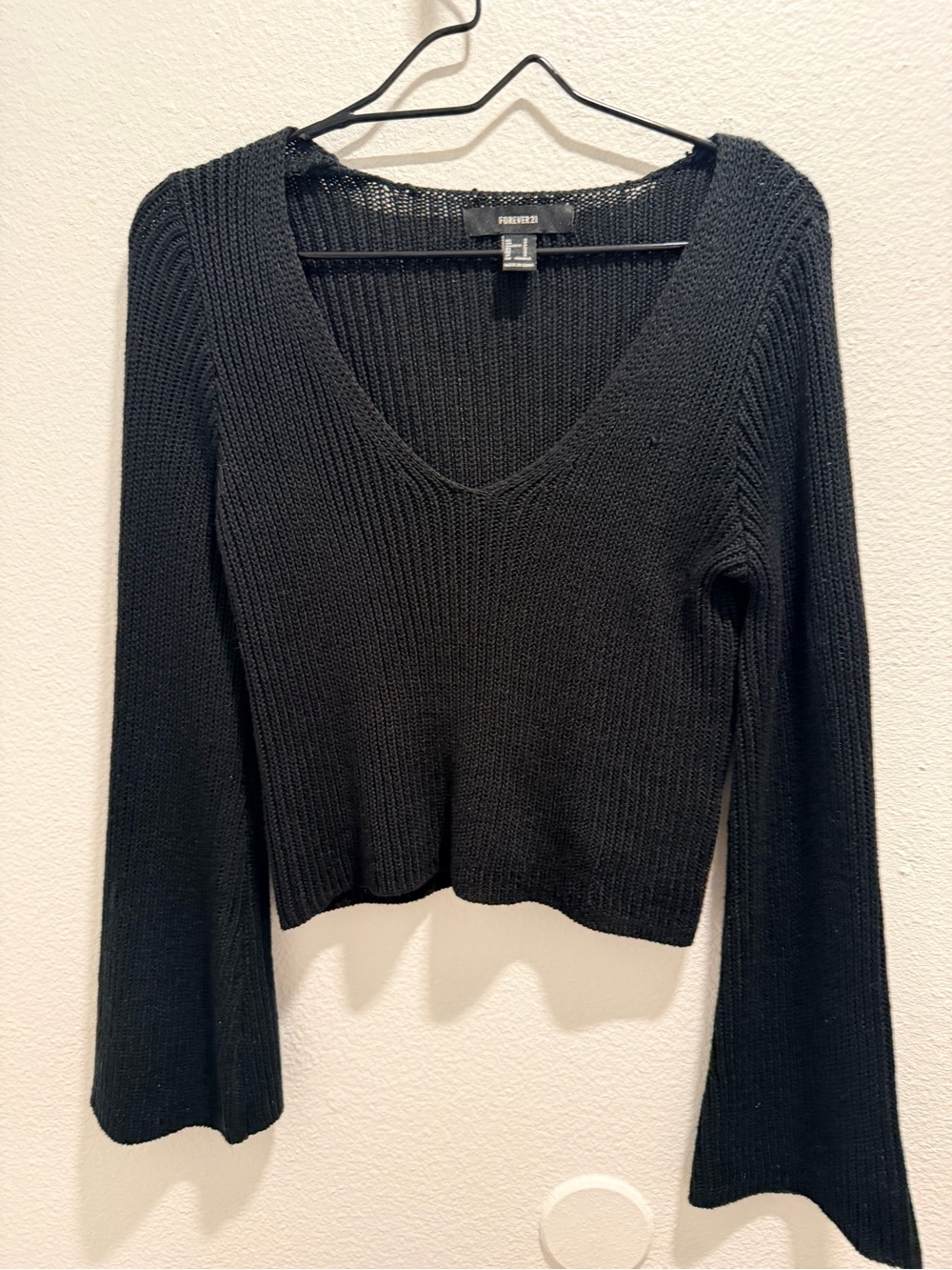 Black V-Neck Cropped Ribbed Knit Sweater with flared sleeve ends | S